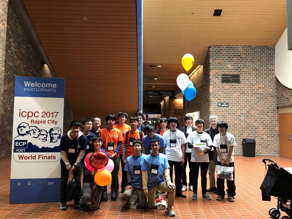 Teams from Japan: Keio University (dark blue), Tokyo Institute of Technology (orange), University of Tokyo (light blue), University of Aizu (white). Photo taken by a professor of University of Tokyo.